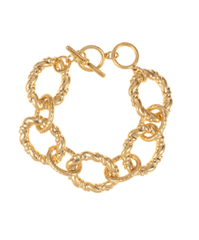 A vibrant gold-toned bracelet composed of large, textured oval links and secured with a stylish toggle clasp.