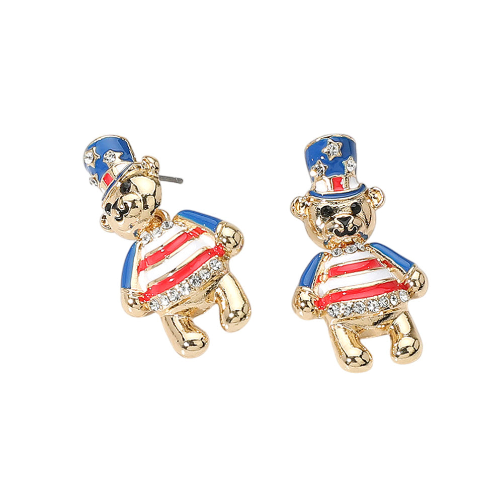 The Hallie Earrings are a playful nod to patriotism, featuring enamel teddy bears dressed in red, white, and blue with lightweight dangle charm.