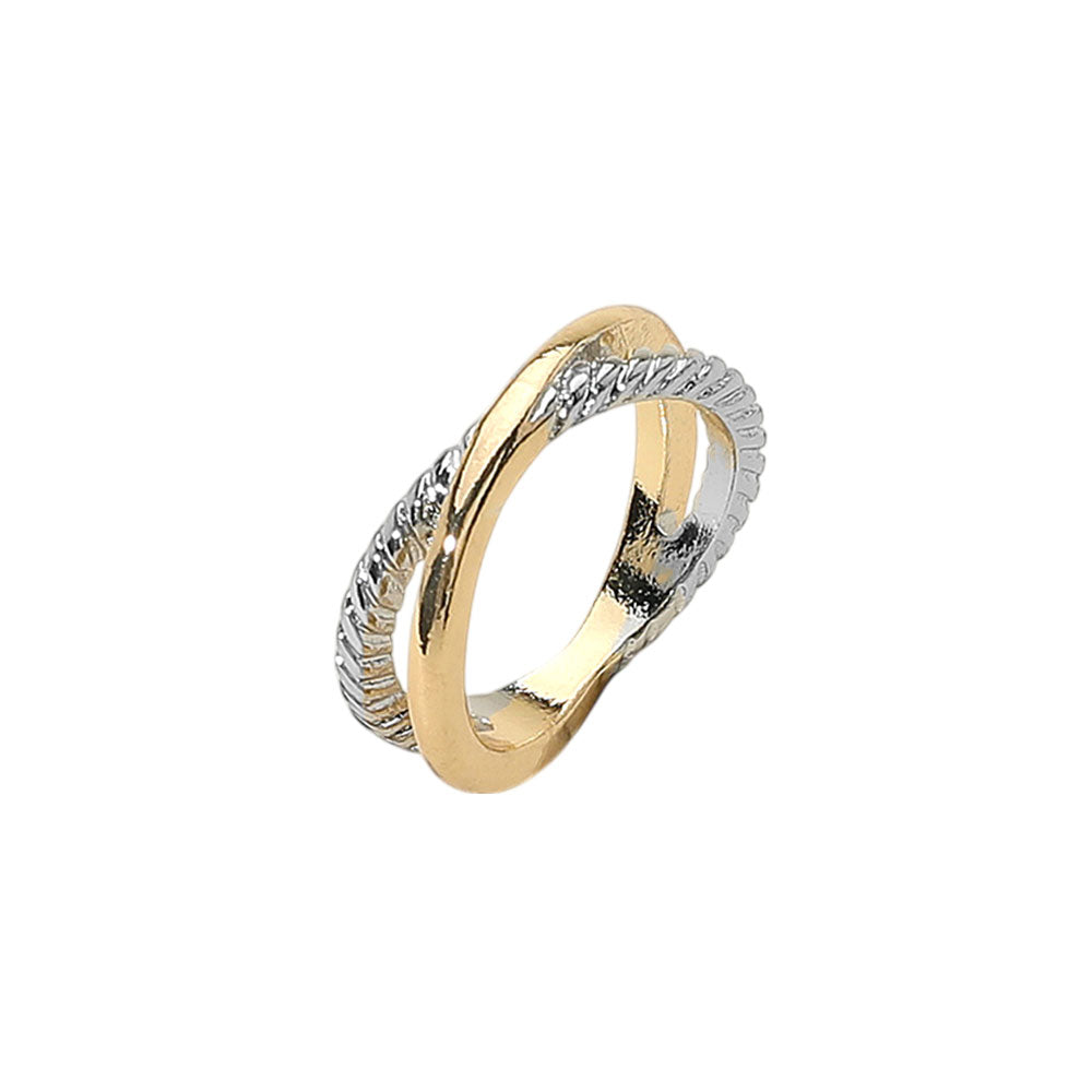 The Lenora Ring blends elegance and edge with its two-tone metal finish and modern crisscross design—perfect for everyday shine.