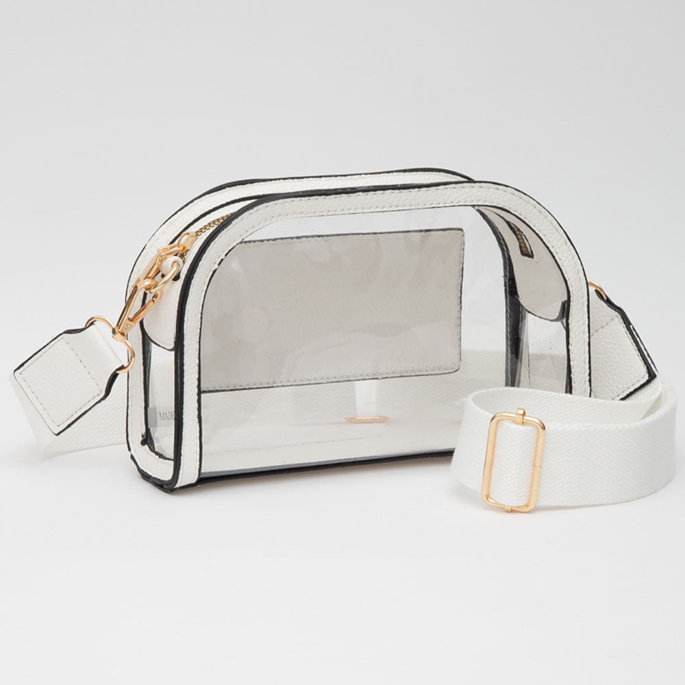 The Nadine Camera Bag combines sleek faux leather accents with a clear, compact design—perfect for game day and hands-free essentials. white