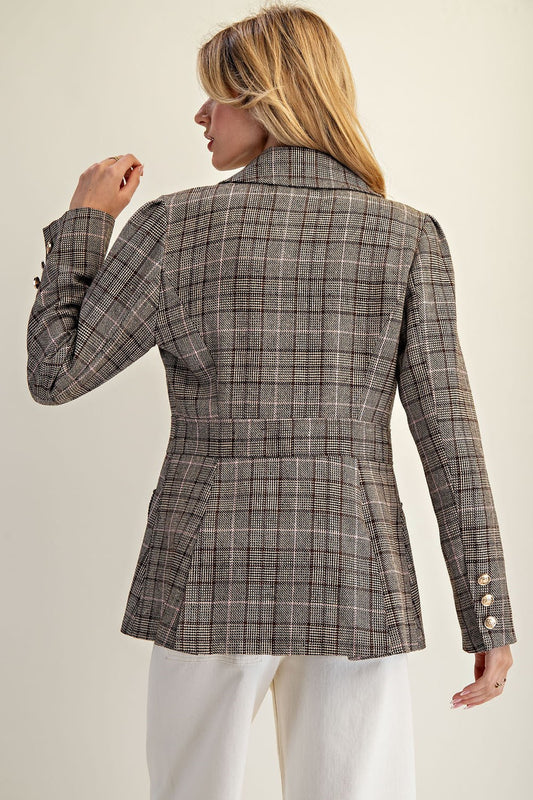 The Renata Blazer features a tailored plaid silhouette with gold button details—an elevated essential for modern, polished styling.

