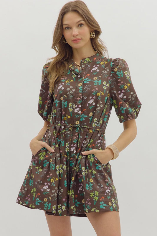 The Selah Floral Mini Dress features a charming floral print, short bubble sleeves, and a removable slim self belt for an effortlessly feminine look.

