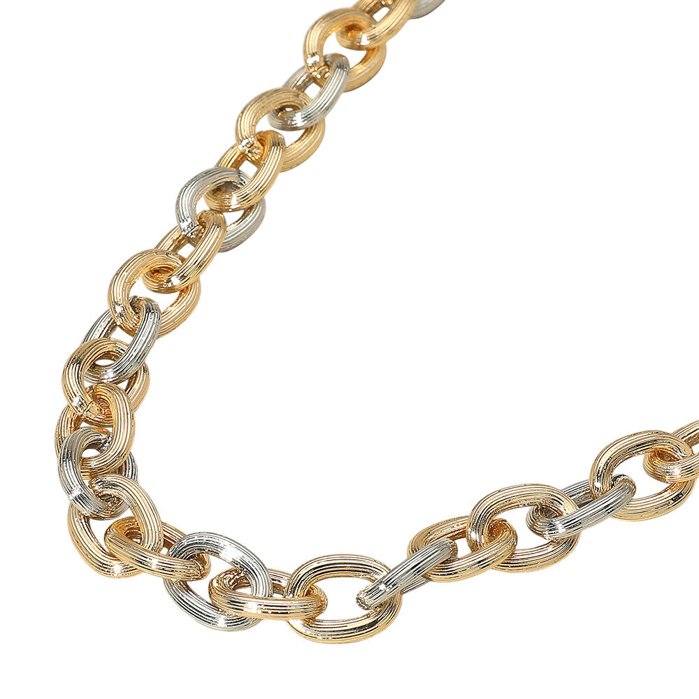 The Simone Necklace delivers bold, mixed-metal shine with textured links and a chunky silhouette—an edgy classic for any look.

