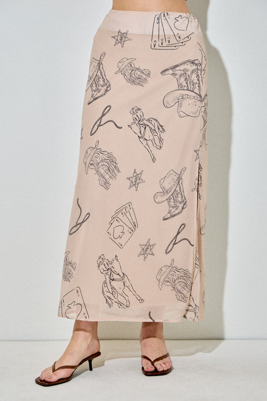The Winifred is a cowboy print midi skirt with a side slit and zipper, made for bold everyday style with a Western twist.