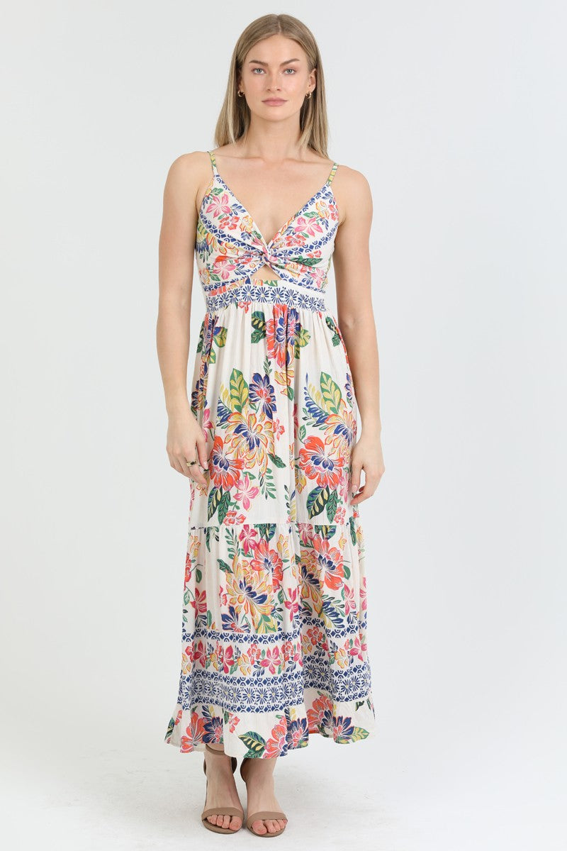  floral print maxi dress with a twist-front bodice and flowing tiered skirt, perfect for summer.