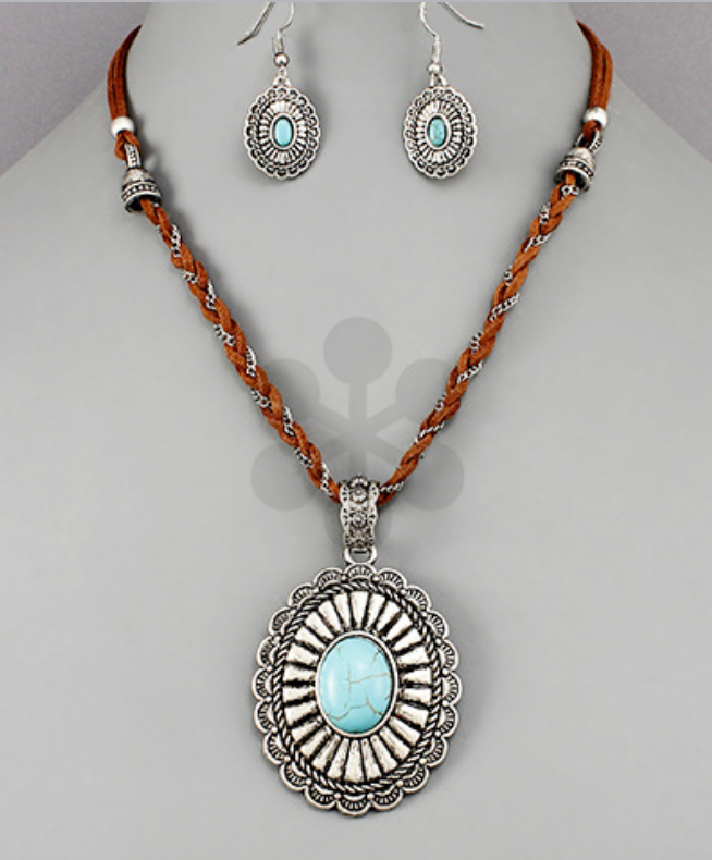 Turquoise pendant necklace with braided leather cord 