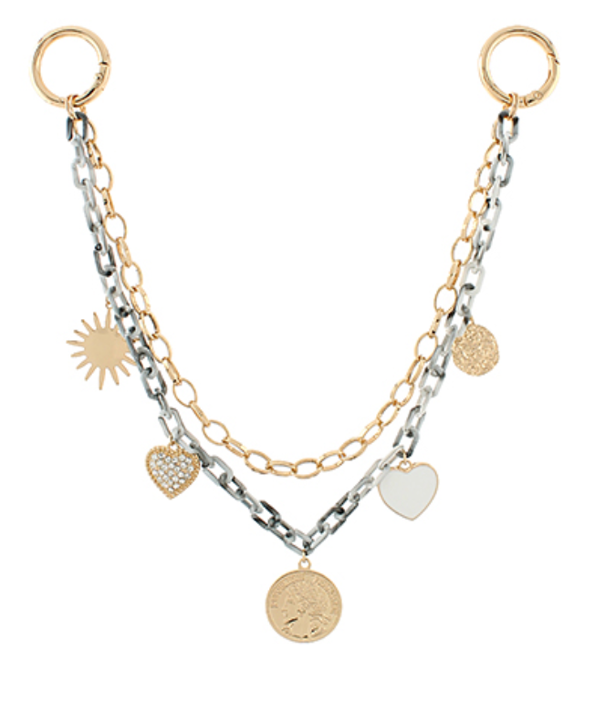 A two-layered shoulder bag strap featuring a mix of gold-toned and silver-toned chunky chains adorned with various gold-toned charms including a sun, a textured heart, a solid white heart, and a coin with a profile, attached to a large O-ring on each end.