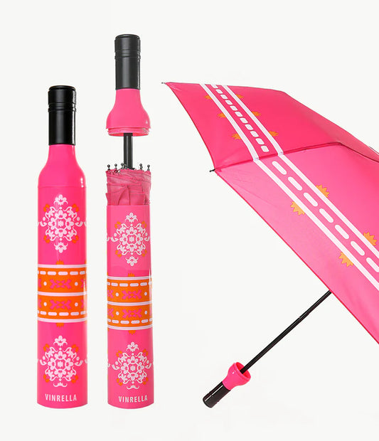 Vinrella Boho Bottle Umbrella in a stylish pink and orange boho design, featuring a unique bottle-shaped storage case and a compact, travel-friendly design.