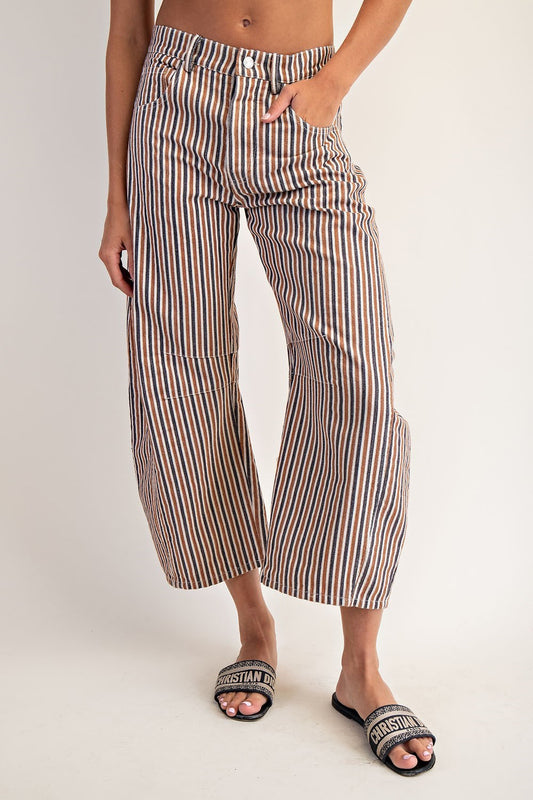 Vintage-inspired mineral wash jeans with subtle stripes and a relaxed barrel leg fit.

