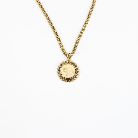 A 22K gold-plated necklace featuring a vintage-style bulldog coin pendant framed with a beaded edge, suspended on a chunky gold chain for a bold and elegant look.