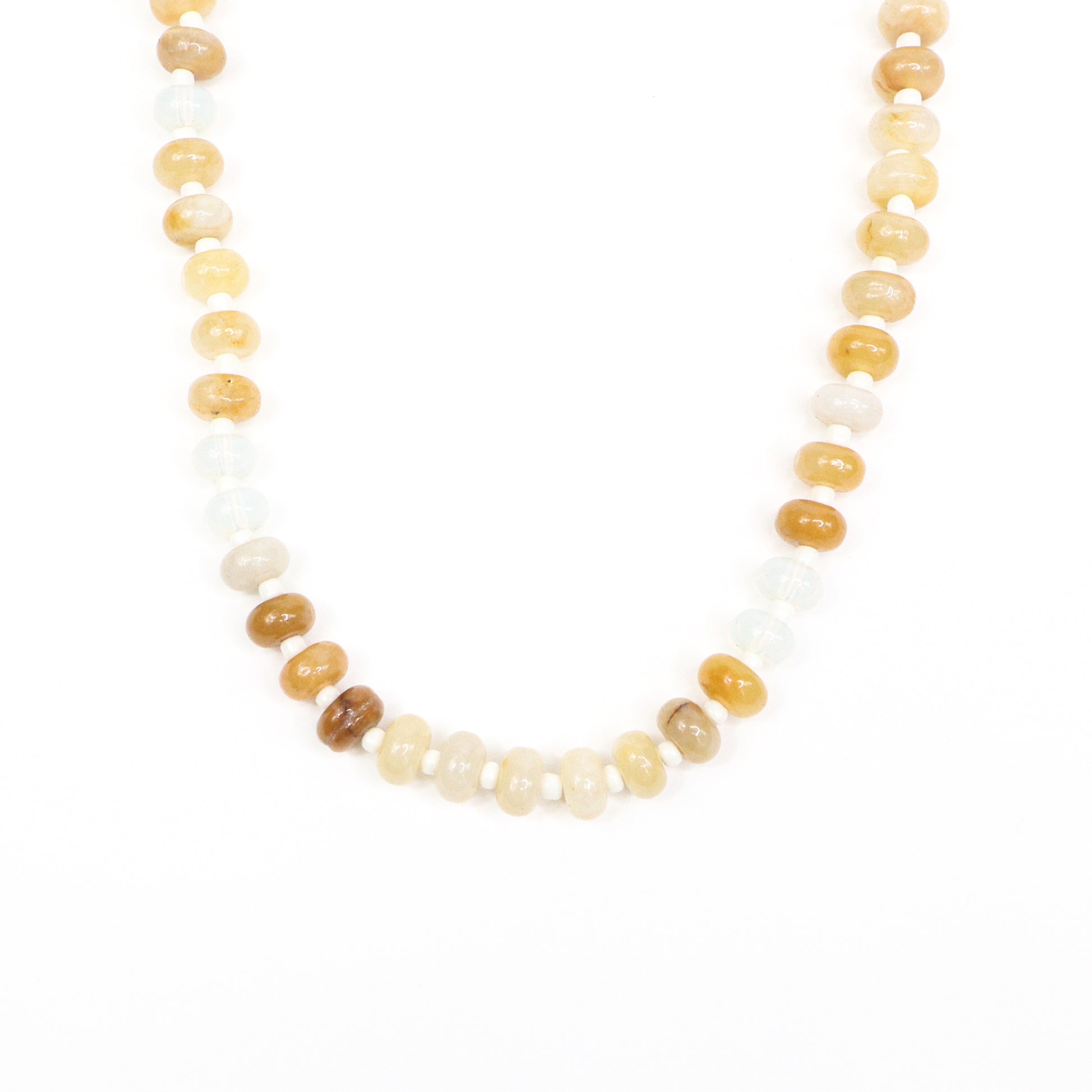 Your new favorite beaded necklace strand—bold, colorful, and made to shine solo or stacked. Beige, natural