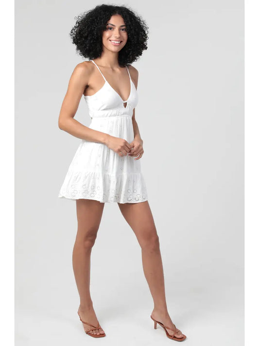 white mini fit & flare sundress with open tie-back and embroidered details