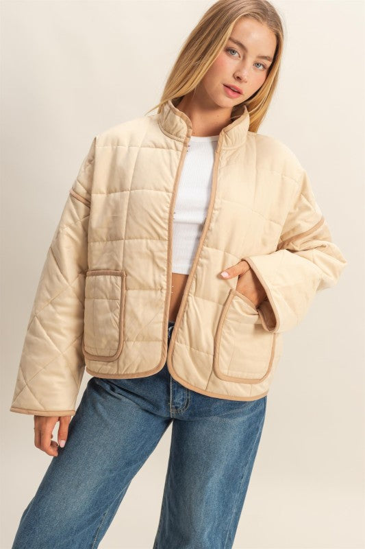 The Rowena Quilted Utility Jacket combines timeless structure with everyday function.