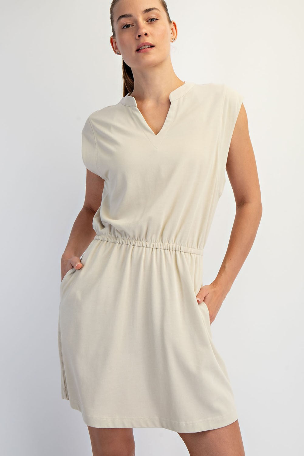 Mineral washed cotton sleeveless mini dress with cinched waist.