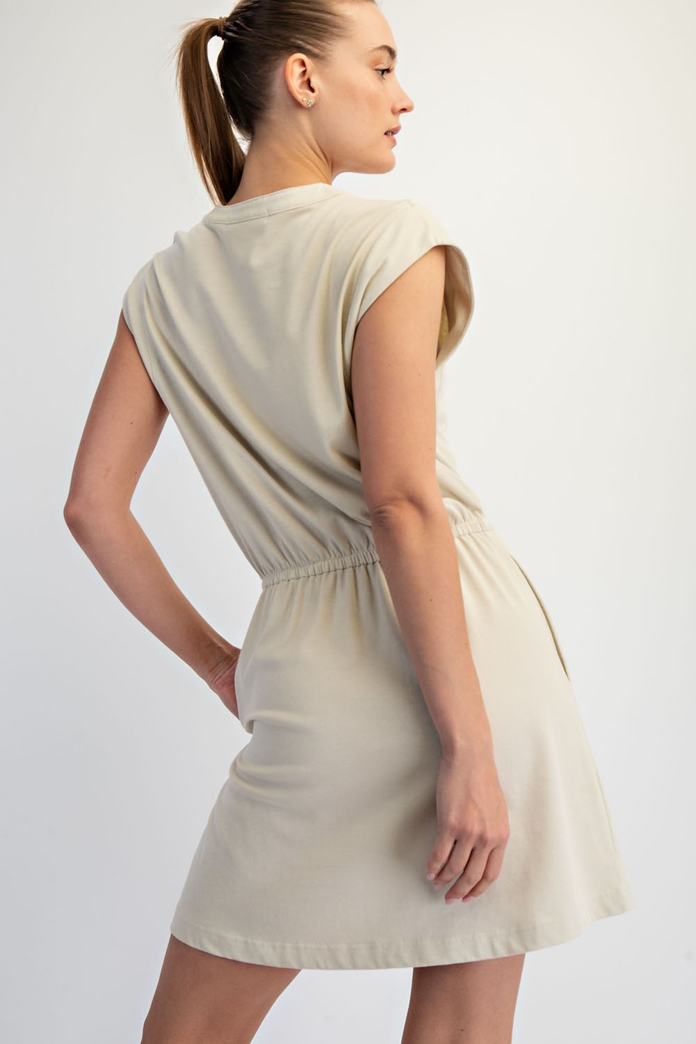 Mineral washed cotton sleeveless mini dress with cinched waist.