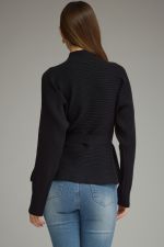 A polished ribbed peplum sweater with a flattering self-tie waist and mock neckline for an effortlessly feminine, put-together look.