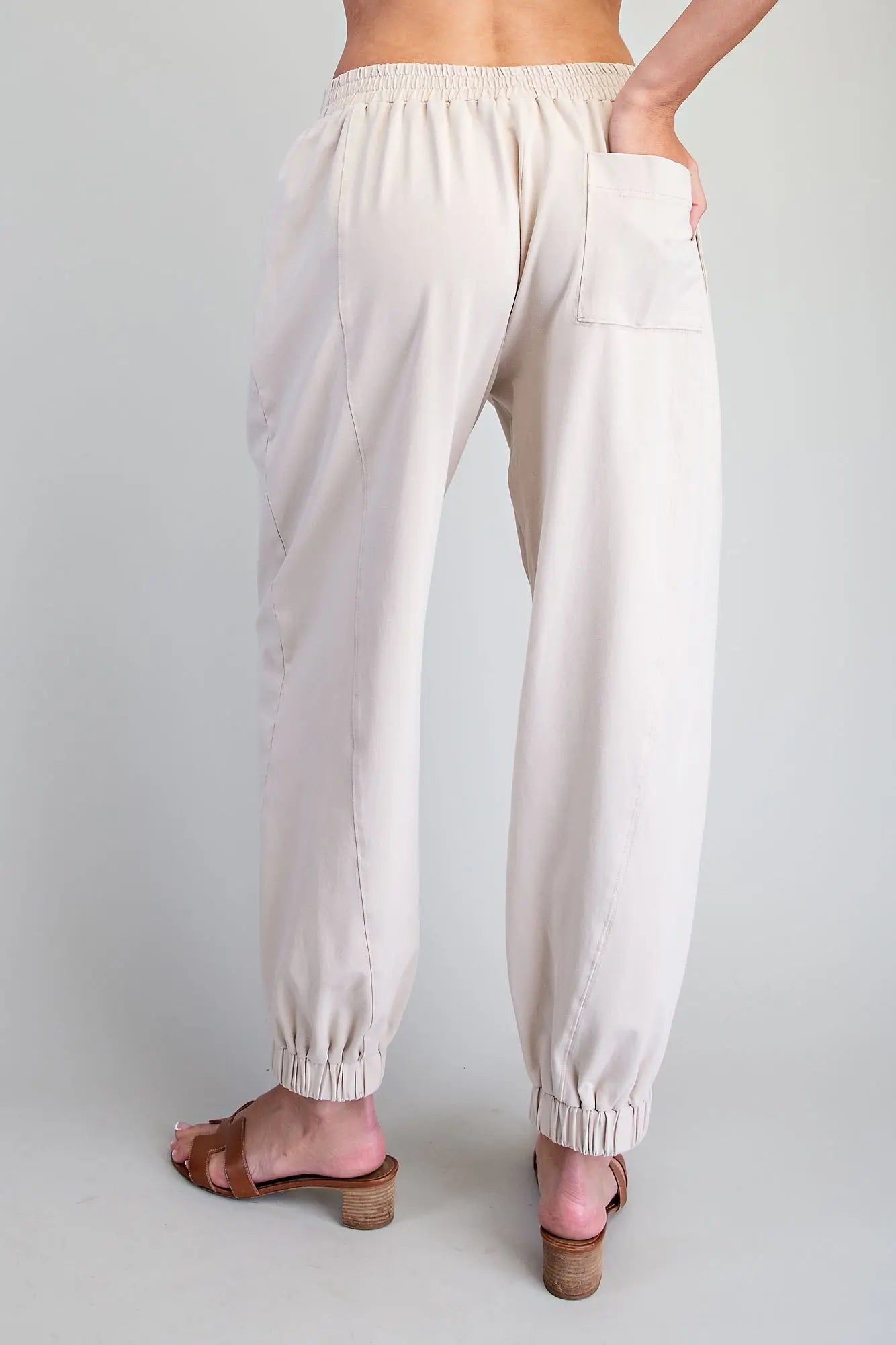 Comfort meets effortless style in these relaxed joggers featuring an elastic waistband, tapered legs, and modern panel detailing.

