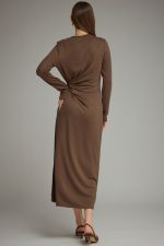 A sleek and effortlessly flattering long sleeve midi dress featuring a soft knit feel, adjustable side-tie waist, and chic side slit.