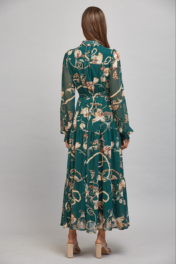 The Loretta Floral Chain Print Midi Dress combines an elegant mixed print with a flattering self-tie waist and breezy chiffon for effortlessly feminine style.