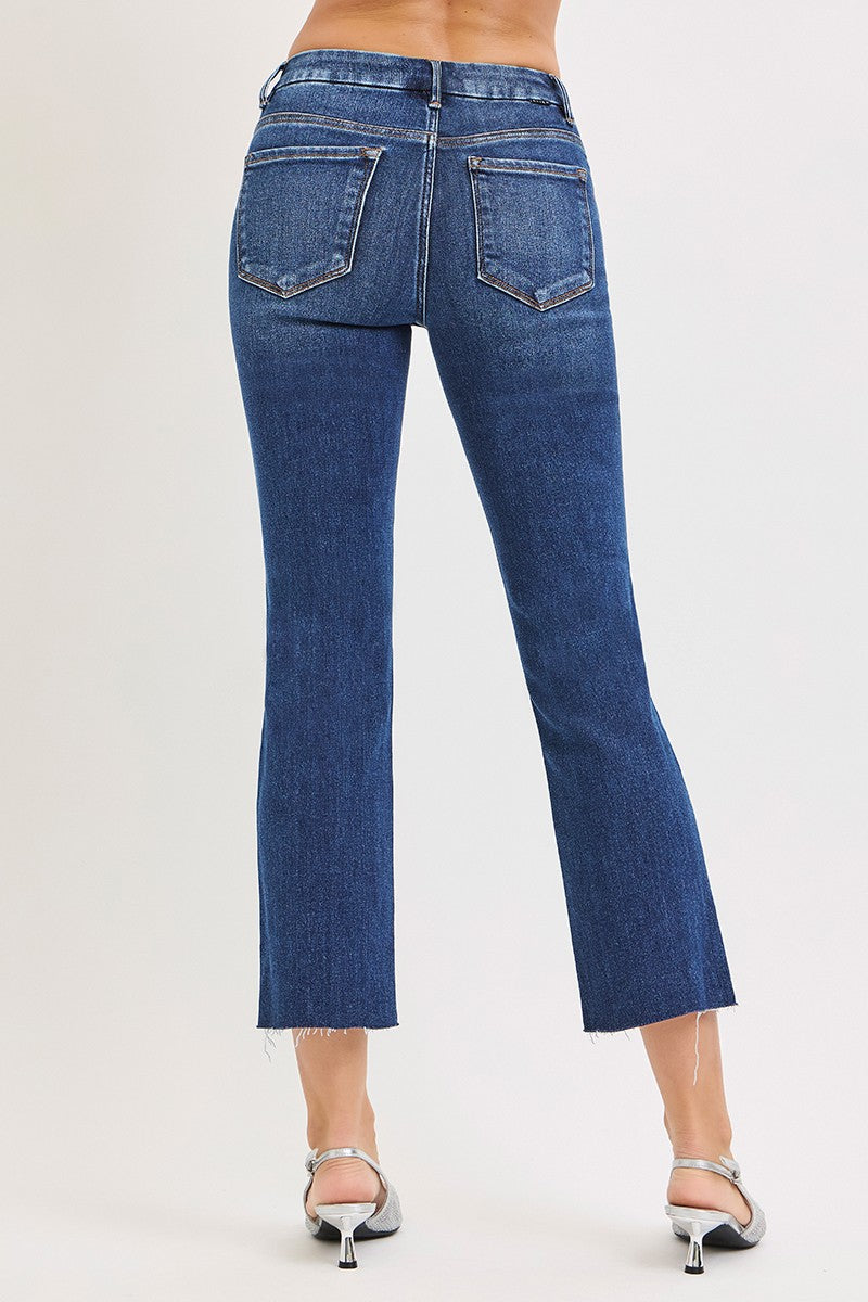The Harriet Tummy Control Crop Straight Jeans combine a flattering high-rise fit with tummy-smoothing support, comfortable stretch, and a versatile dark wash.
