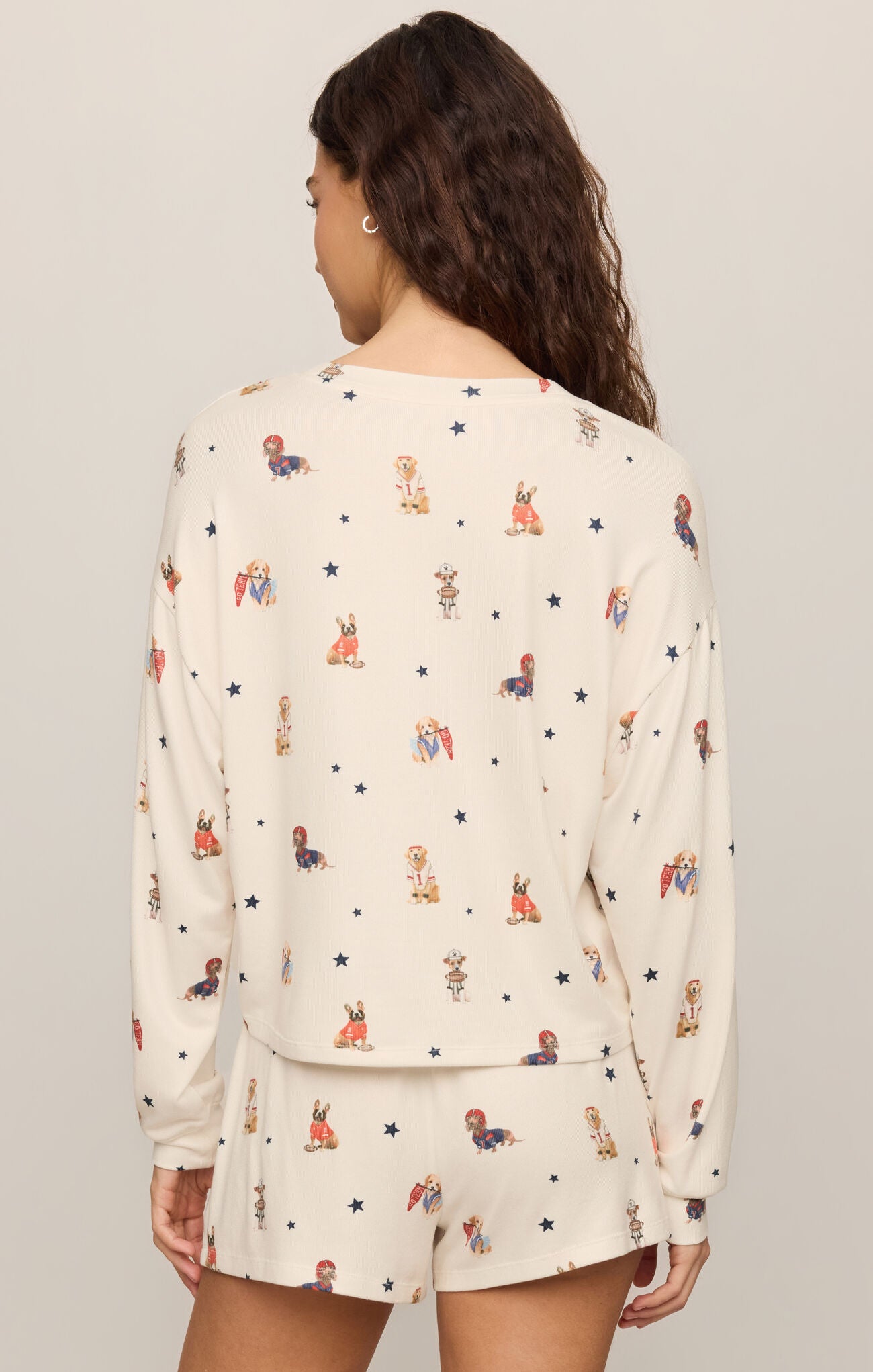 A luxurious silky jersey sleep top featuring a soft crew neckline, long sleeves, and a comfortable stretch fit for restful nights and relaxed mornings.