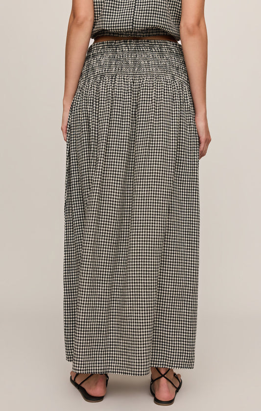 A breezy plaid linen-blend maxi skirt featuring a flattering smocked waistband and flowing silhouette for effortless, everyday elegance.
