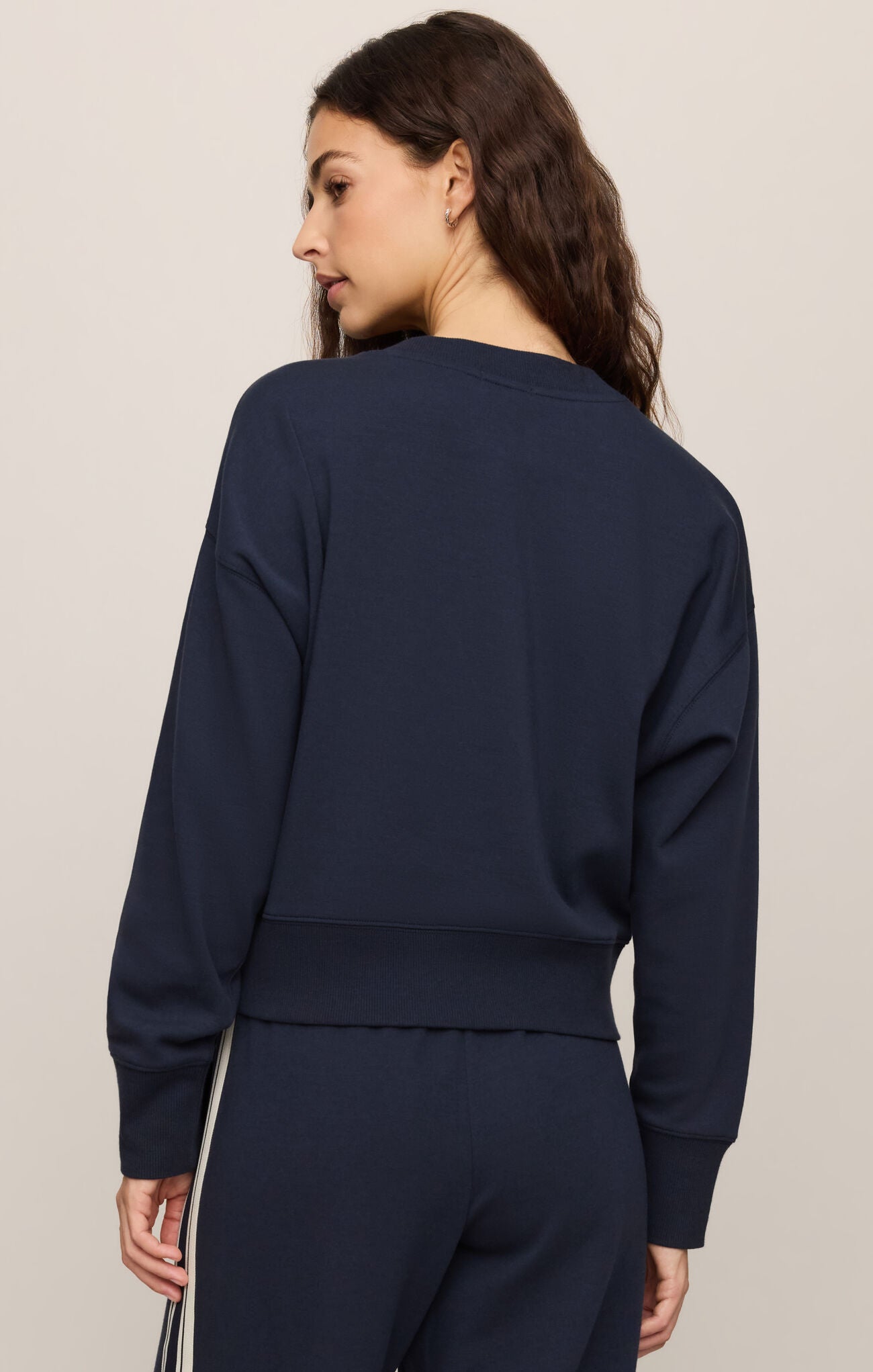 A timeless crewneck sweater crafted from a premium cotton-blend knit, offering effortless sophistication and all-day comfort.