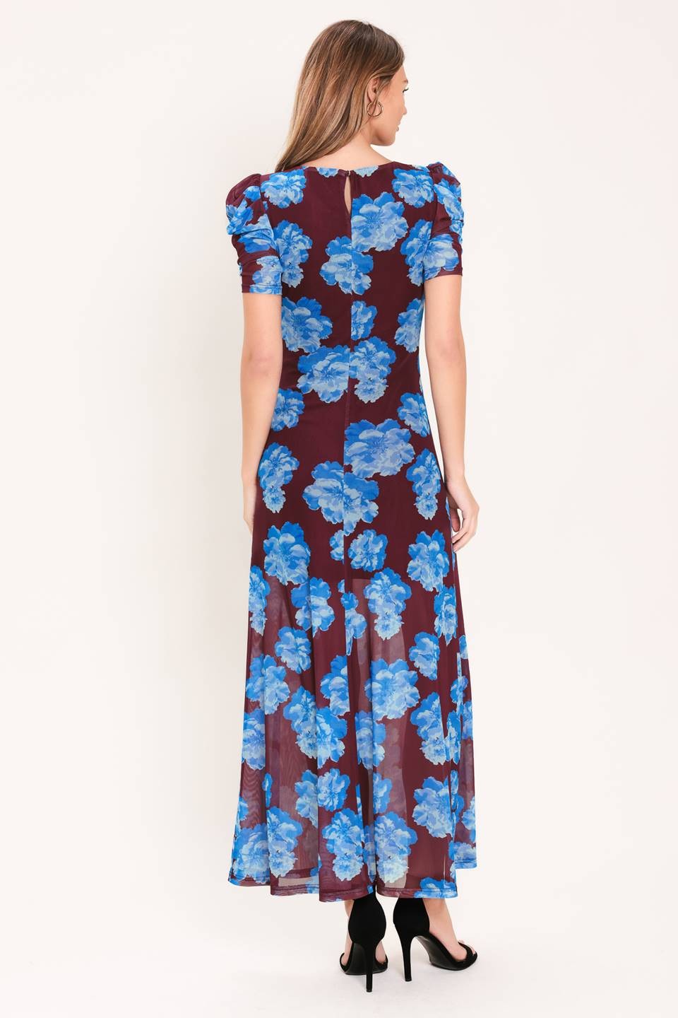 back printed power mesh midi dress, featuring elegant puff sleeves, a flattering silhouette, and lightweight comfort you'll love all season.
