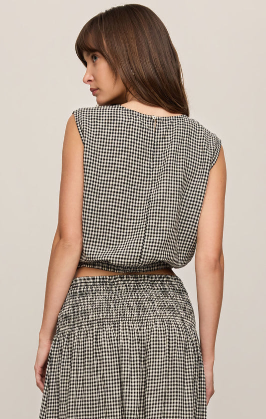 A breezy plaid linen-blend bubble top featuring a classic crew neckline and a flattering billowy silhouette for effortlessly elevated warm-weather style.
