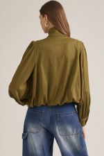 A polished long-sleeve jacket featuring a structured stand collar, gathered shoulder details, and a classic button front for effortless sophistication.

