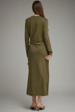 A sleek and effortlessly flattering long sleeve midi dress featuring a soft knit feel, adjustable side-tie waist, and chic side slit.
