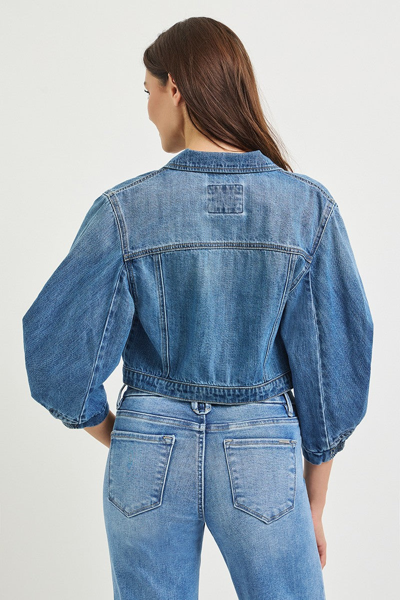 The Josephine Cropped Jacket makes a statement with a flattering cropped length and dramatic three-quarter balloon sleeves.
