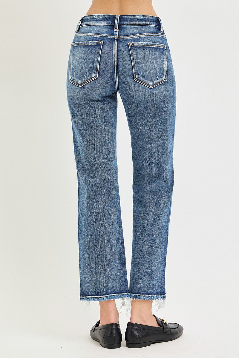 Flattering and easy to style, these mid-rise cropped straight-leg jeans feature tummy control for a smooth, confident fit and a timeless denim silhouette.