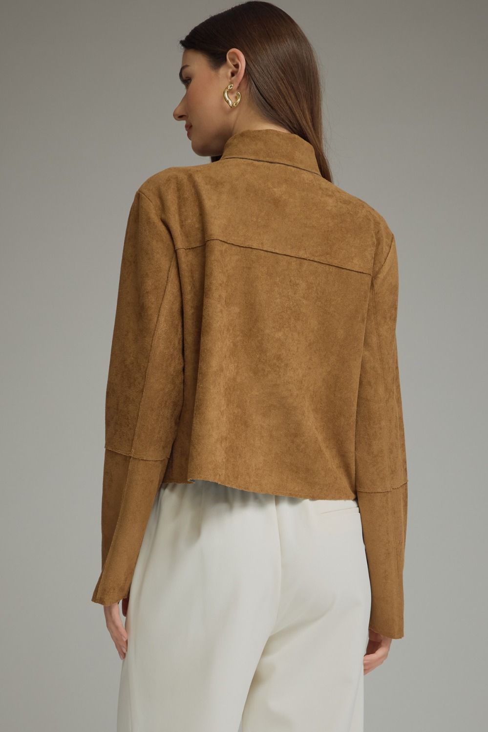 A chic cropped jacket featuring a feminine self-tie neckline, button-front closure, and raw-edge hem for an effortlessly stylish finish.