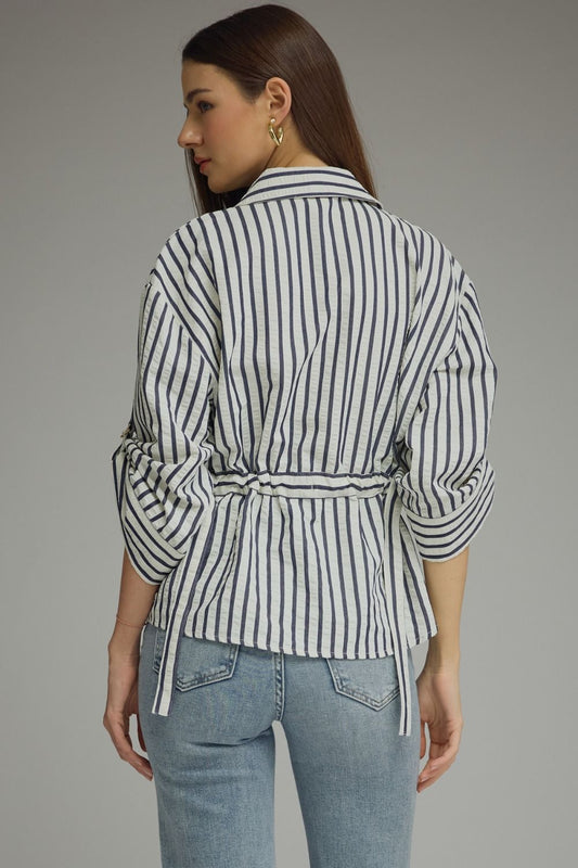 A lightweight striped woven top featuring a foldover neckline, adjustable sleeve tabs, and polished details for effortless everyday style.