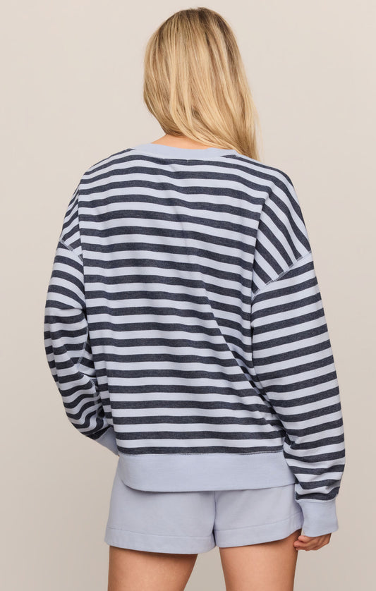 A cozy striped French terry pullover featuring a classic crew neckline and relaxed fit for effortless everyday comfort.
