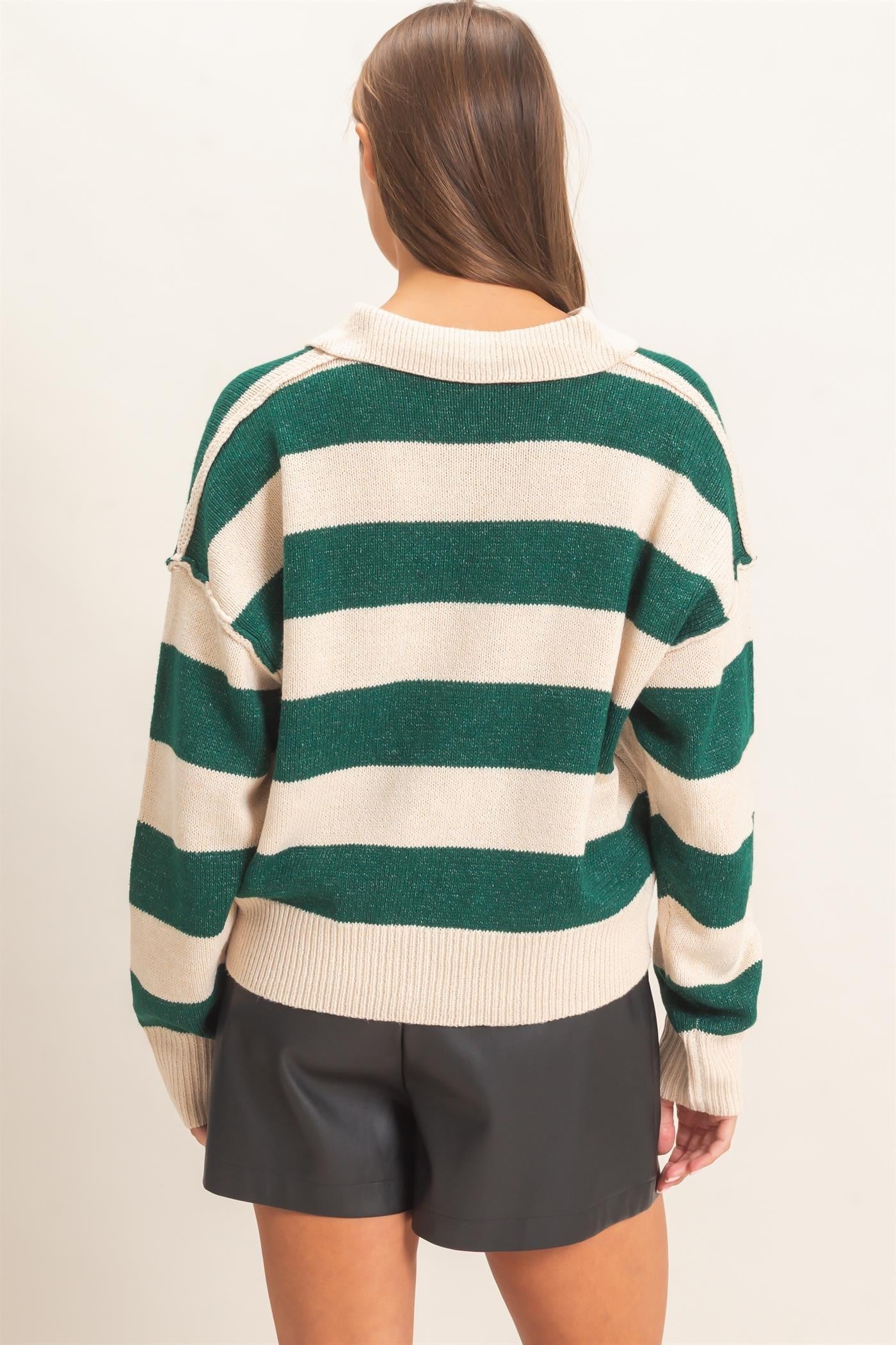 A relaxed striped sweater with a statement wide collar and ribbed cuffs that brings effortless polish to everyday casual style.