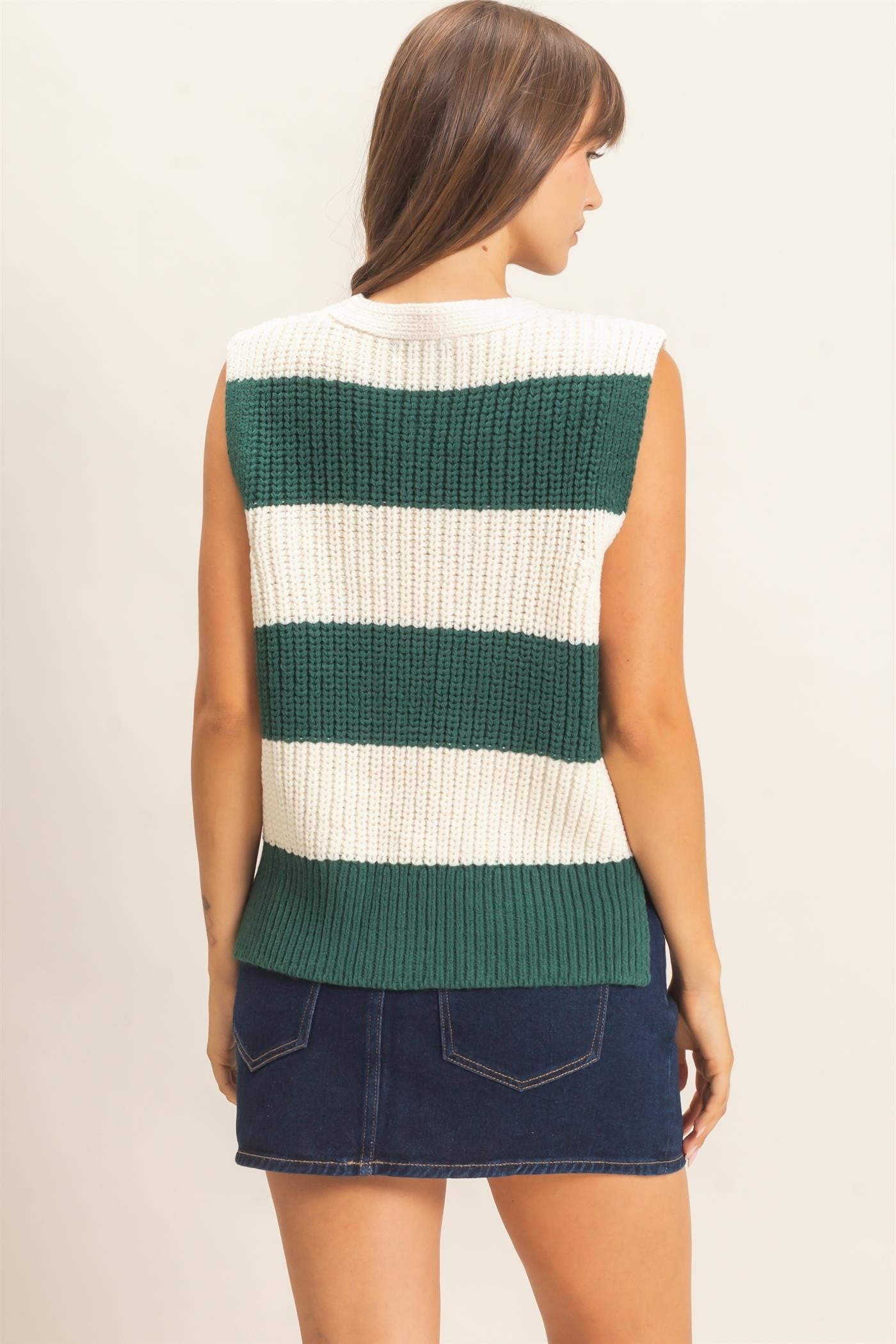 A bold striped sweater vest with a deep V-neckline and relaxed fit, perfect for polished layering from the office to after-hours.
