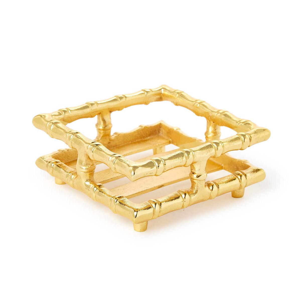 A gold-finished square bamboo-style tray or stand with a slatted open bottom, photographed on a clean white background.