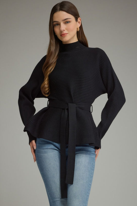 A polished ribbed peplum sweater with a flattering self-tie waist and mock neckline for an effortlessly feminine, put-together look.