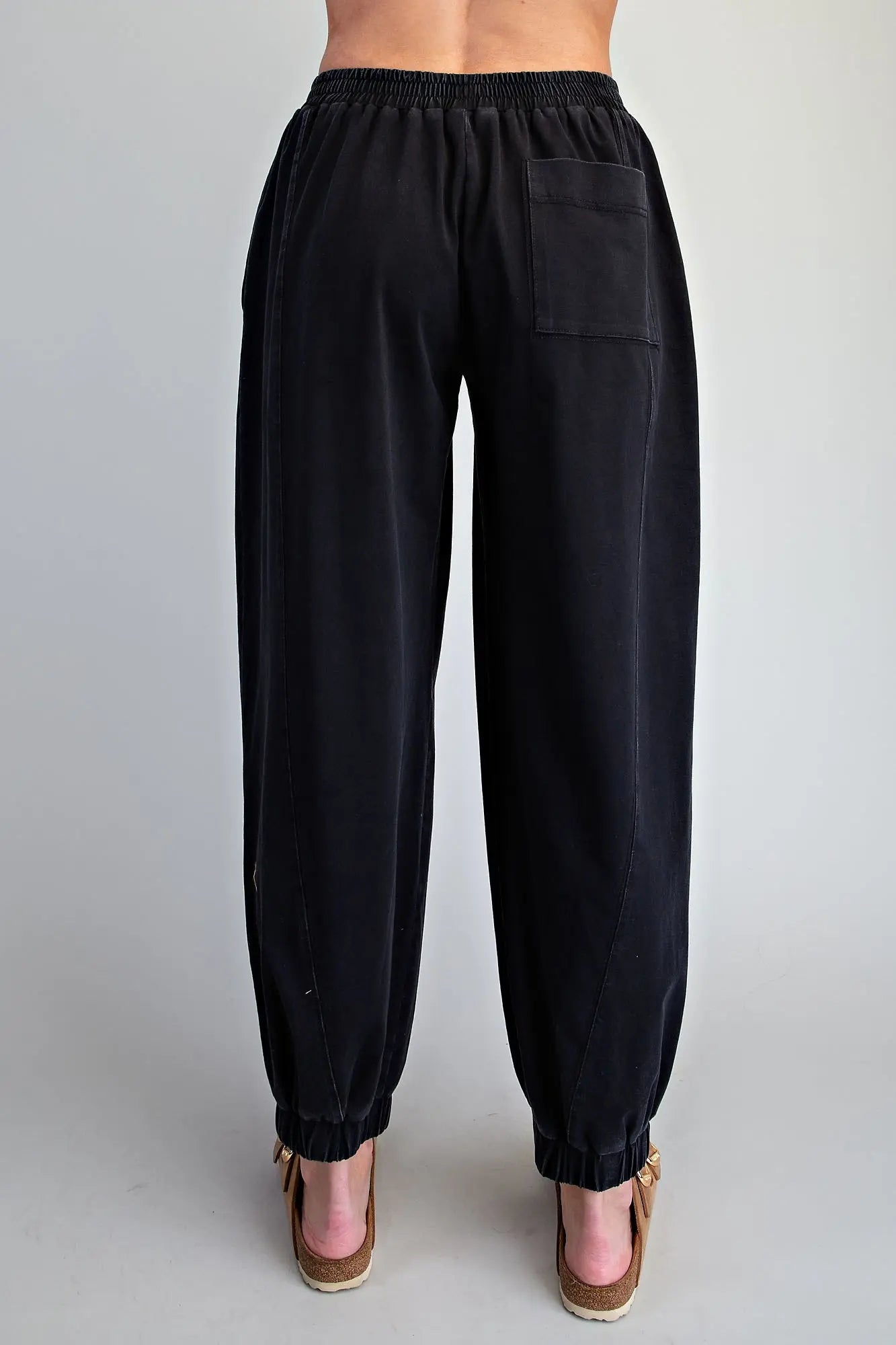 Comfort meets effortless style in these relaxed joggers featuring an elastic waistband, tapered legs, and modern panel detailing.

