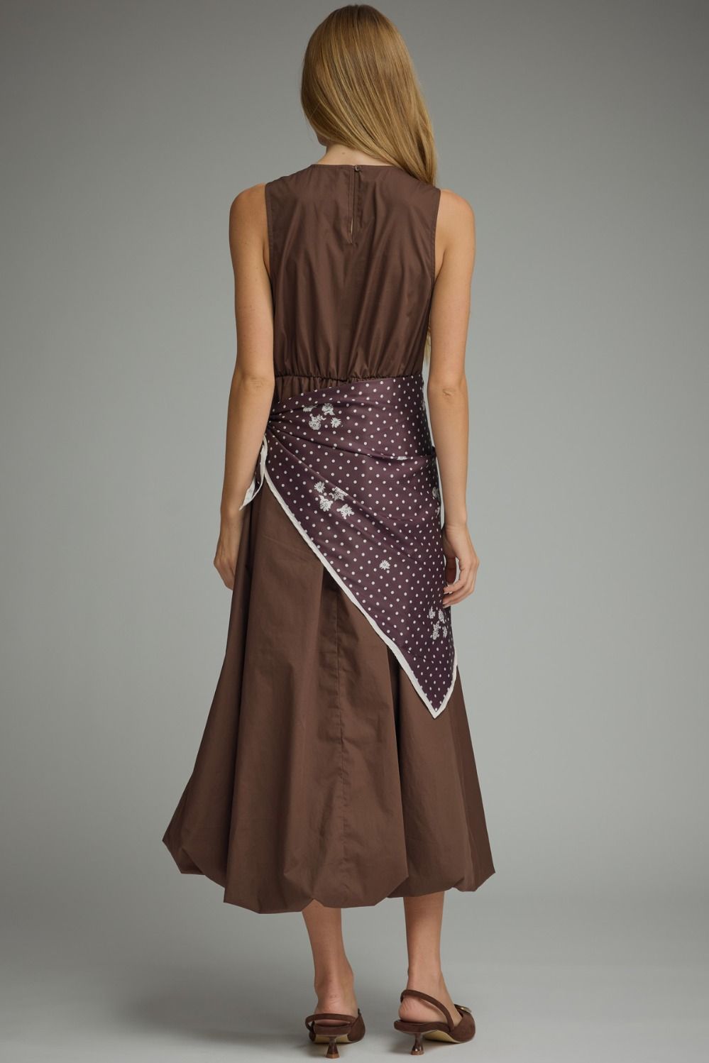 Effortlessly elegant and undeniably unique, the Sable Scarf Dress blends modern sophistication with artistic detail for a statement look you'll love.