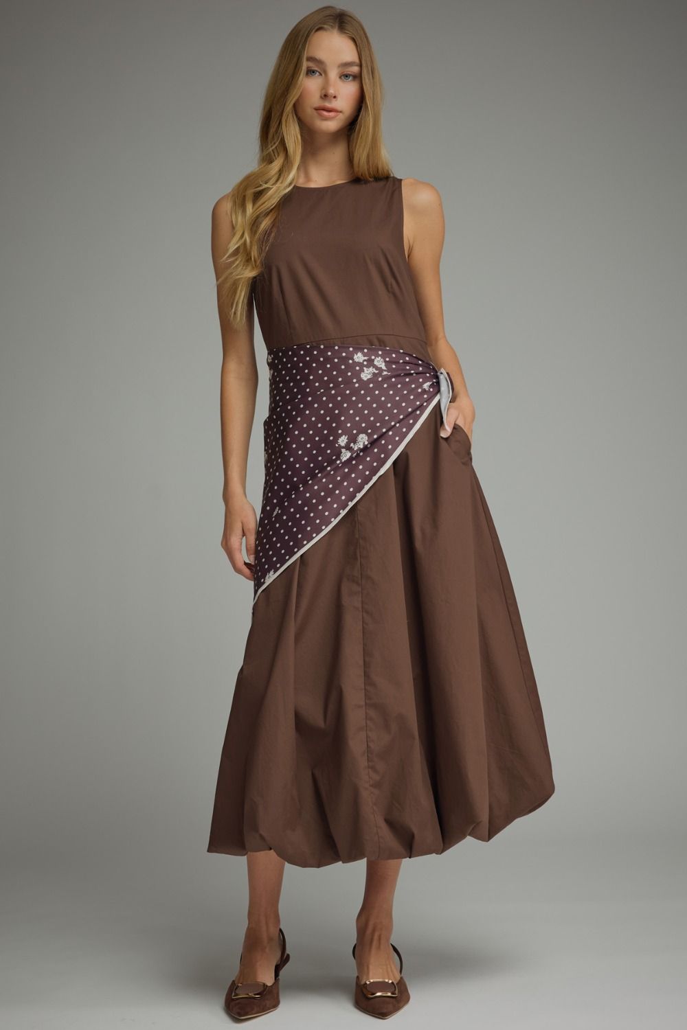 Effortlessly elegant and undeniably unique, the Sable Scarf Dress blends modern sophistication with artistic detail for a statement look you'll love.