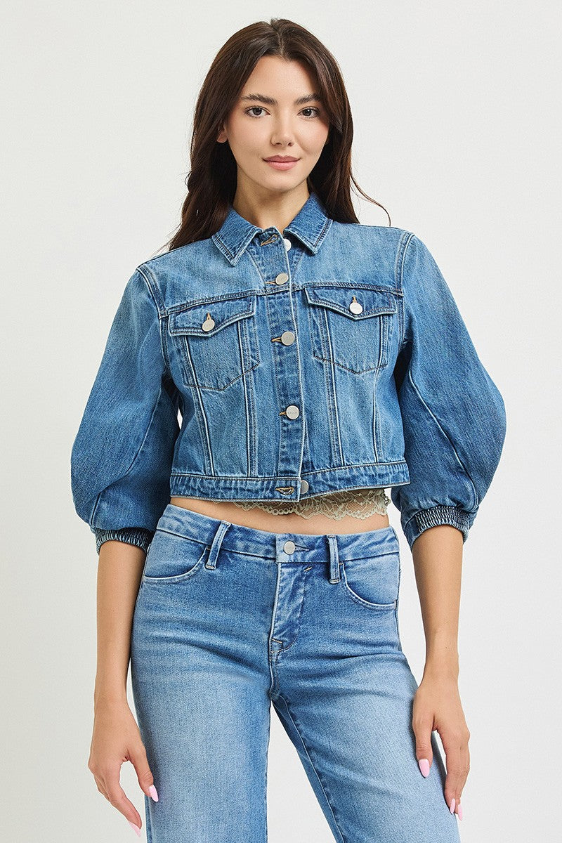 The Josephine Cropped Jacket makes a statement with a flattering cropped length and dramatic three-quarter balloon sleeves.
