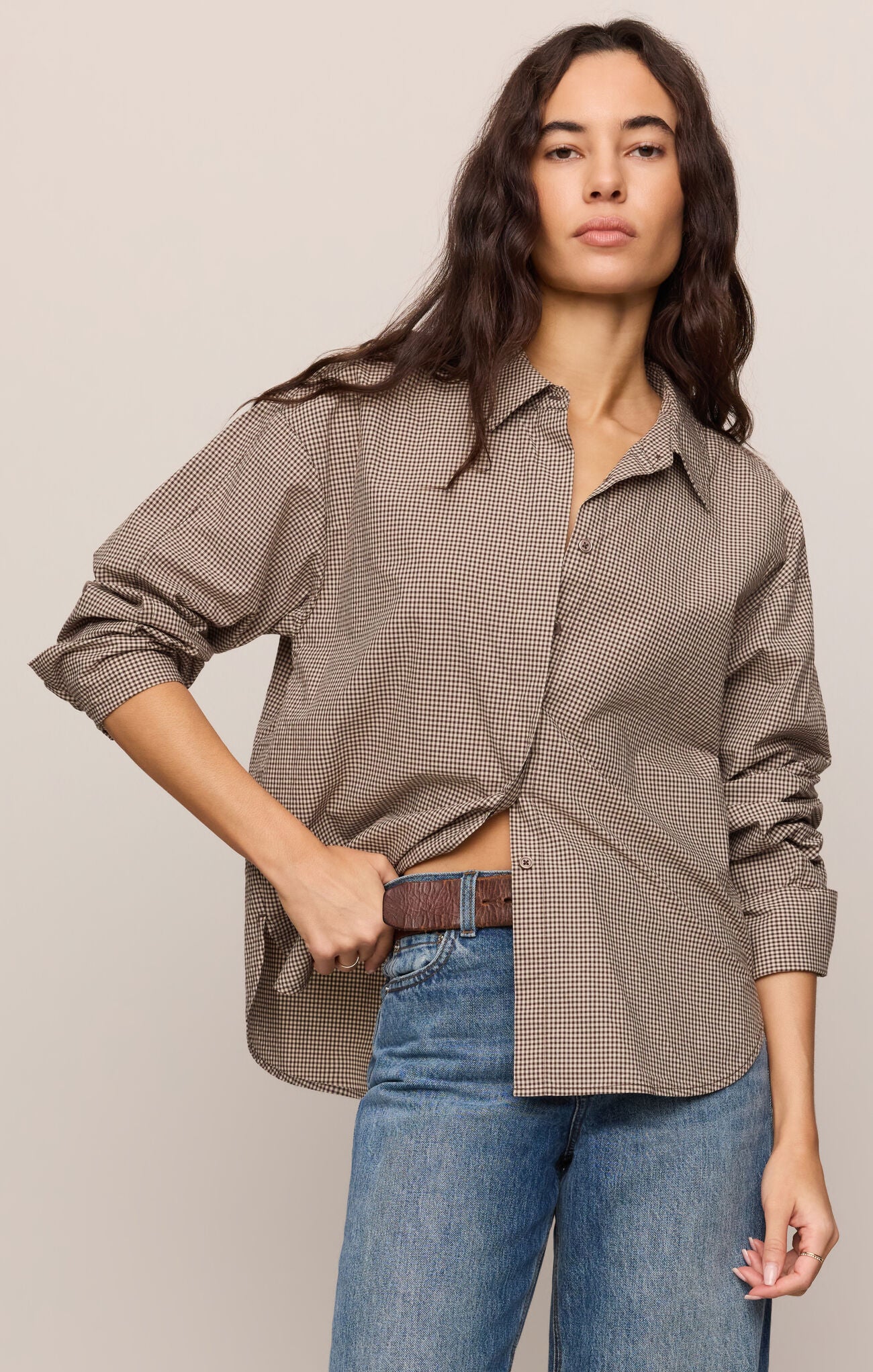 A timeless plaid button-down shirt crafted from crisp 100% cotton poplin with a classic collared silhouette for effortless everyday style.