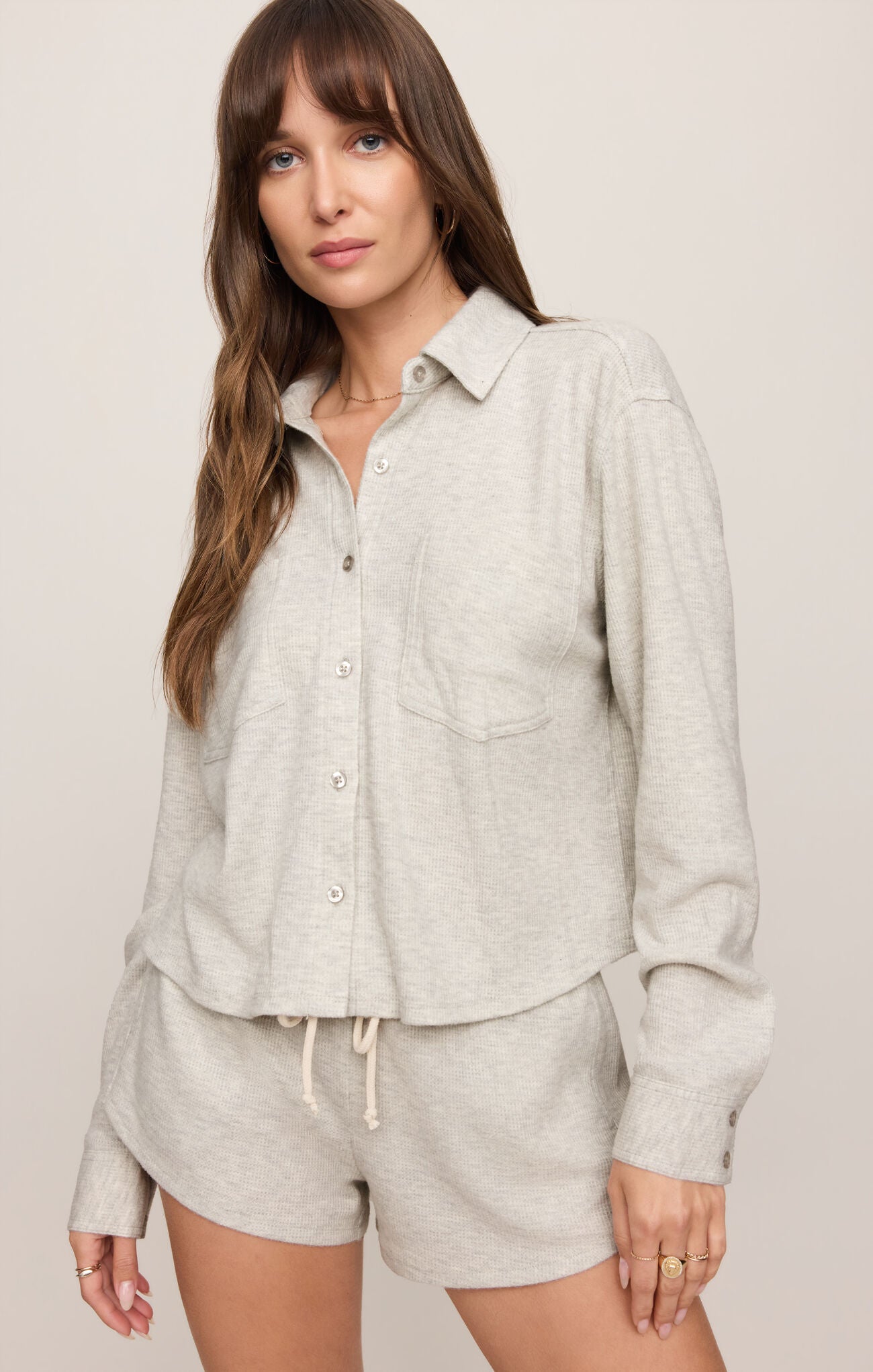 A cozy brushed thermal top featuring a classic collar, button-front design, and soft stretch fabric for effortless everyday comfort.
