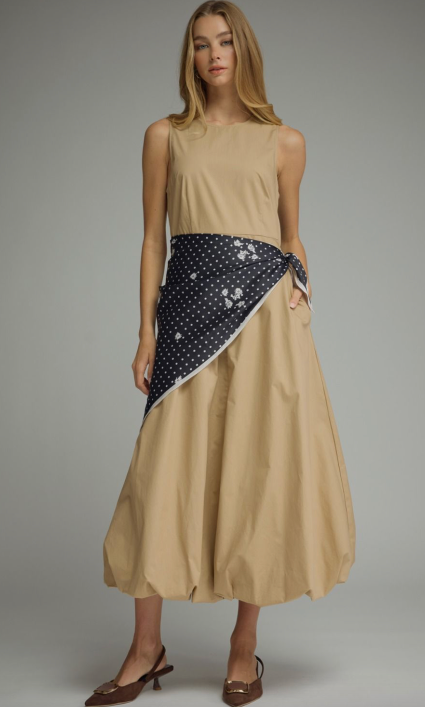 Effortlessly elegant and undeniably unique, the Sable Scarf Dress blends modern sophistication with artistic detail for a statement look you'll love.