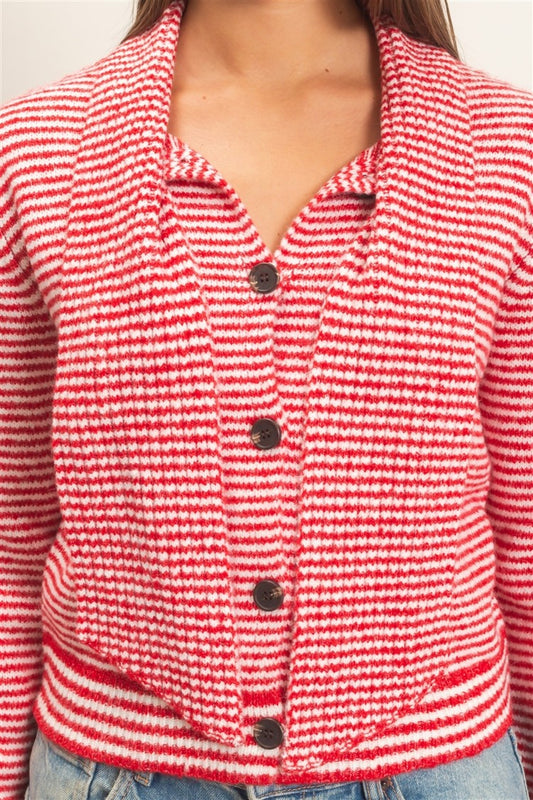 A chic striped knit sweater featuring a full button-up front and attached scarf neckline for a polished, modern layered look.

