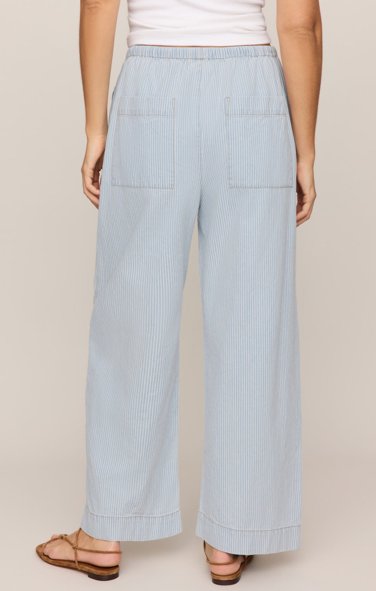 back of High-rise cotton denim pants featuring a striped print with two pockets
