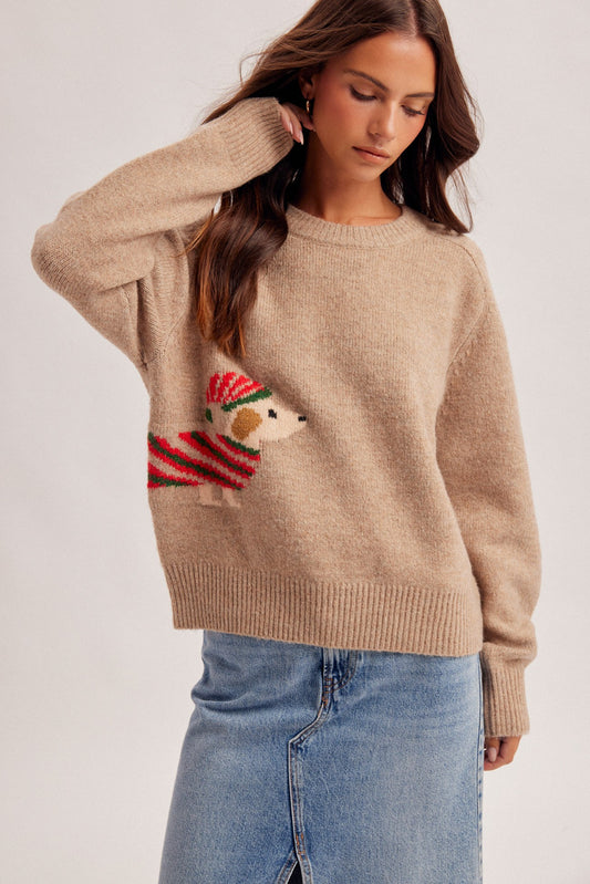 Cozy up for the holidays in this festive crew neck sweater featuring an adorable Christmas dog design and a soft, comfortable knit feel.

